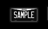 Custom black and white license plate