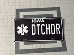 Custom black and white license plate