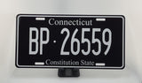 Custom black and white license plate