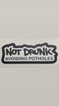 NOT DRUNK AVOIDING POTHOLES